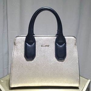 Aldo Champagne handbag